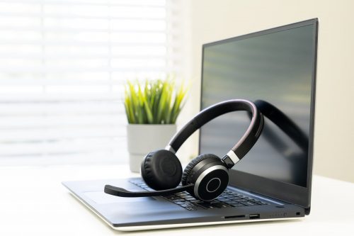 headphone-with-laptop-in-office-XGRYP9A-min
